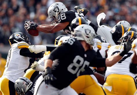 raider vs steelers record|last time steelers won a playoff game.